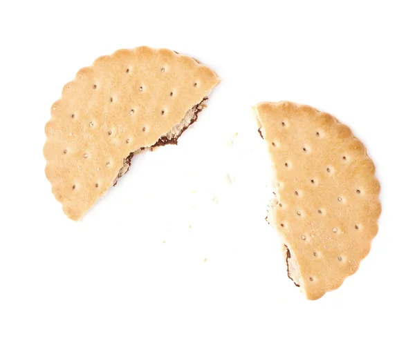 Podzielone na kawałki cookie na białym tle nad białe tło — Zdjęcie stockowe