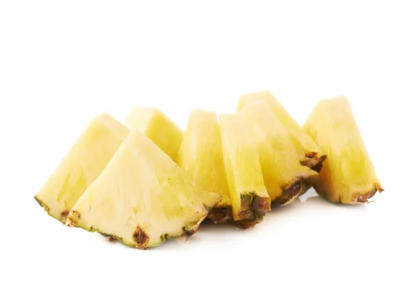 Pile of pineapple slices isolated over white background — Stock Photo, Image