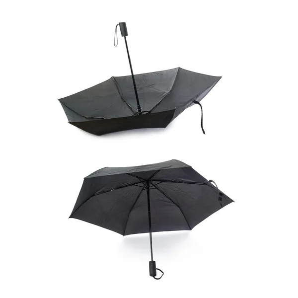 Uppsättning av svart paraply isolerade över den vita bakgrunden — Stockfoto