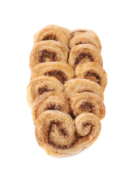 Högen av cookies isolerade över den vita bakgrunden — Stockfoto