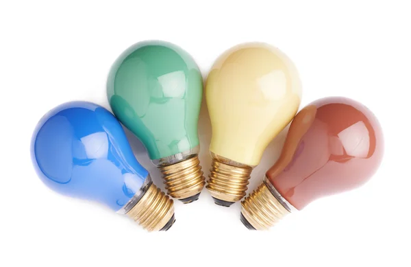 Pile of electric bulbs lying on side, isolated over the white background — Stock Photo, Image