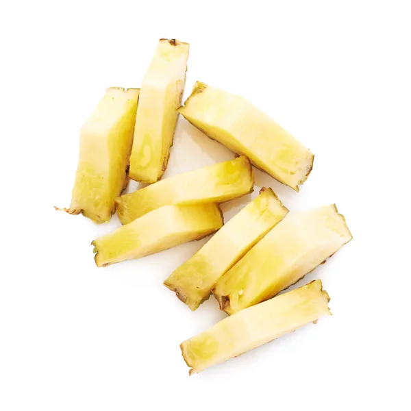 Haufen Ananasscheiben isoliert über weißem Hintergrund — Stockfoto
