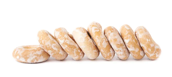 Pile de petits gâteaux avec trou isolé sur le fond blanc — Photo