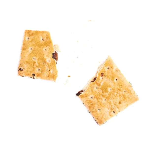 Broken into pieces cookie isolated over the white background — Stock Photo, Image