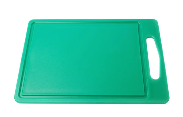 Unused plastic green cutting board isolated over the white background — Stock Photo, Image