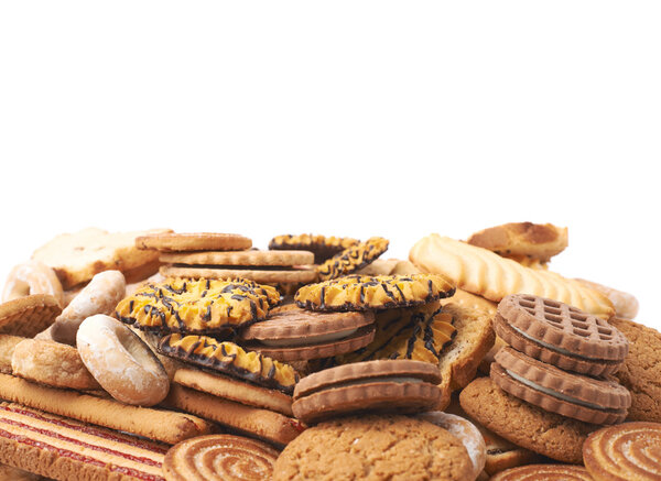 Pile of mix cookies isolated over the white background