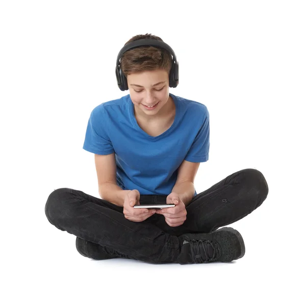 Bonito adolescente menino sobre branco isolado fundo — Fotografia de Stock