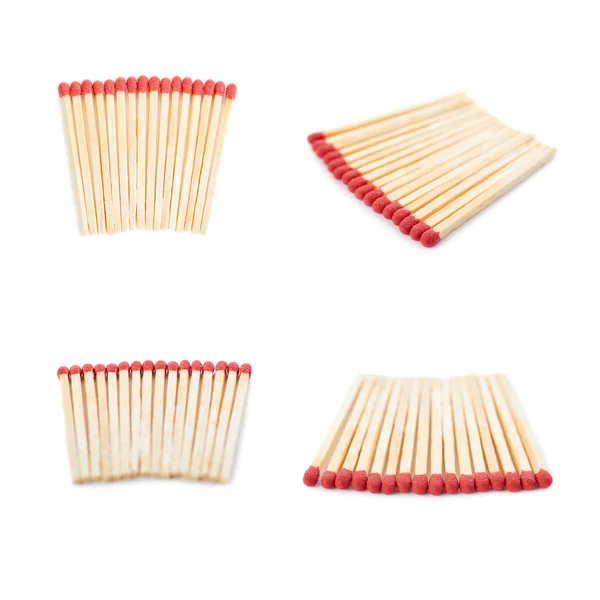 Set di pali di fiammiferi in legno isolati sullo sfondo bianco — Foto Stock