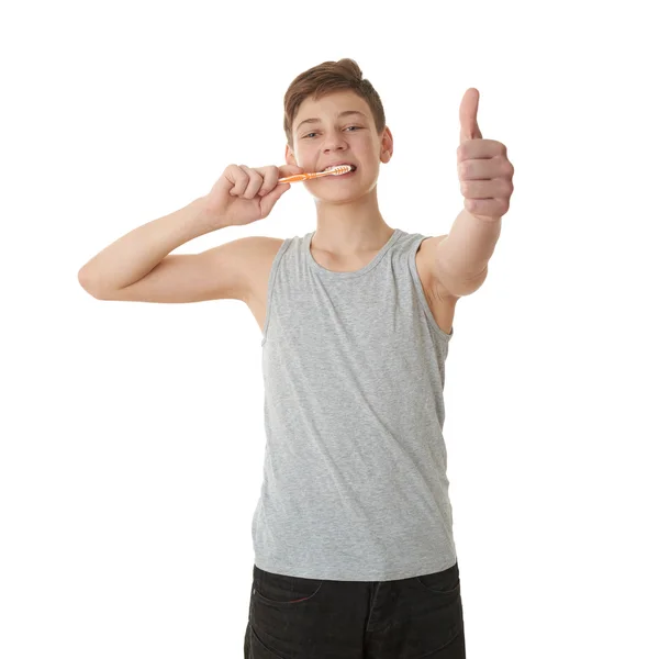 Niedliche Teenager Junge über weißen isolierten Hintergrund — Stockfoto