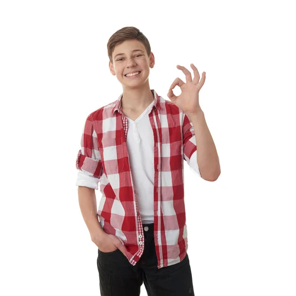 Söt tonåring pojke över vita isolerade bakgrund — Stockfoto