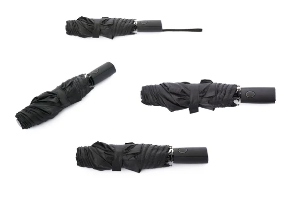 Set of Black umbrella isolated over the white background — Stock Photo, Image
