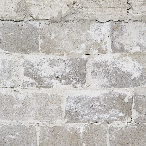 Velho fragmento de parede de tijolo sujo — Fotografia de Stock