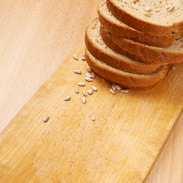 Bread and seeds — Stock Photo, Image