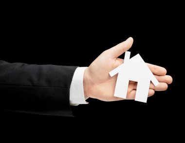 takım elbise içinde el