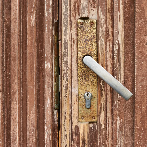 Fragmento da porta de madeira — Fotografia de Stock