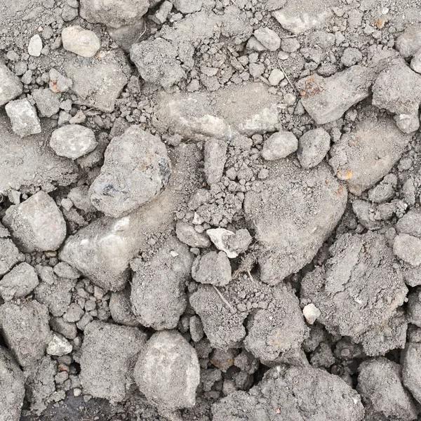 Solo seco coberto de pedras — Fotografia de Stock