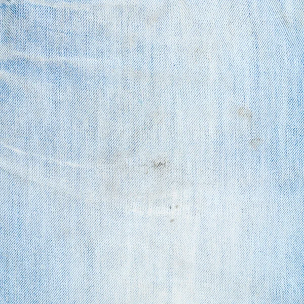 Fragmento de tecido jeans denim — Fotografia de Stock