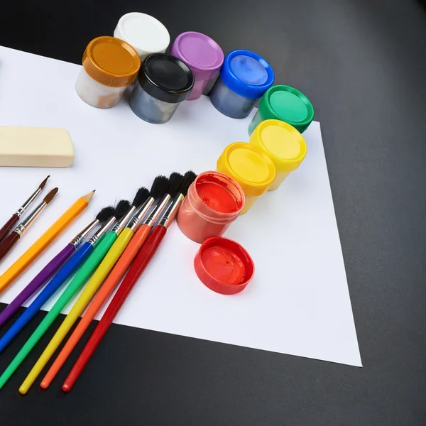 Multiple drawing paints and brushes — Stock Photo, Image