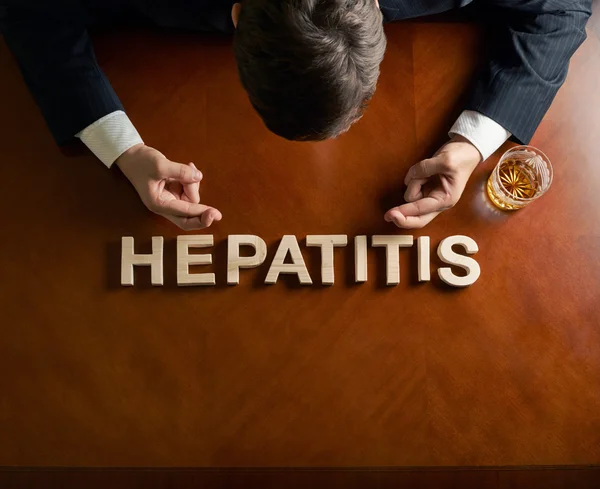 Devastated man and word hepatitis — Stock Photo, Image