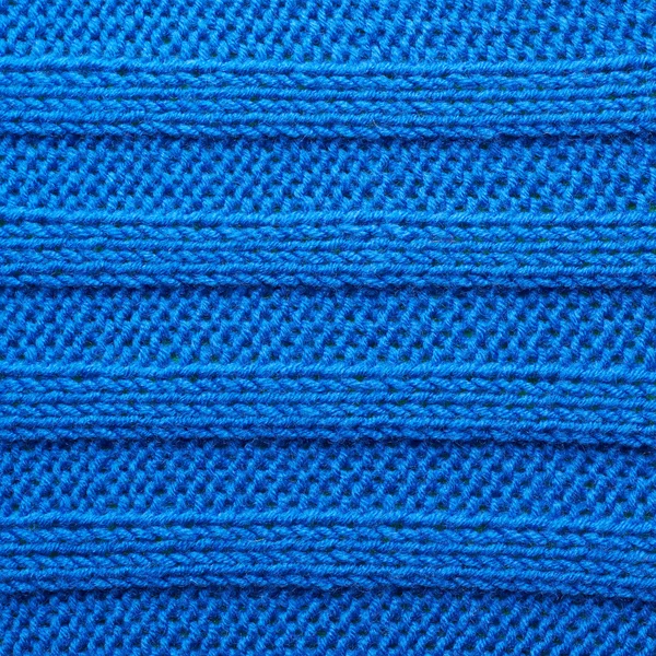 Knitted blue material fragment