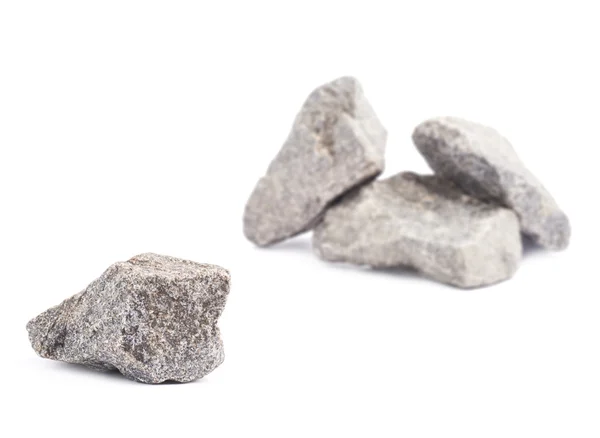 Granit sten framför flera stenar — Stockfoto