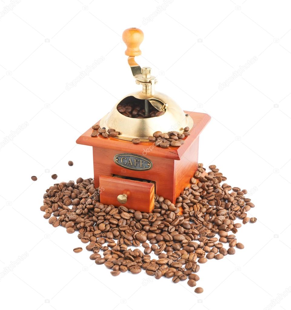 Traditional manual wooden coffee grinder isolated