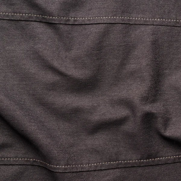 黑色的牛仔裤布材料片段 — 图库照片