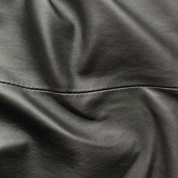 Black leather material fragment — Stock Photo, Image