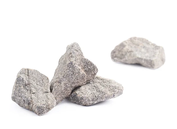 Multiple granite stones in front of single stone — Stock Photo, Image