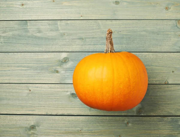Pumpkin on  wooden boards — Stock Photo, Image