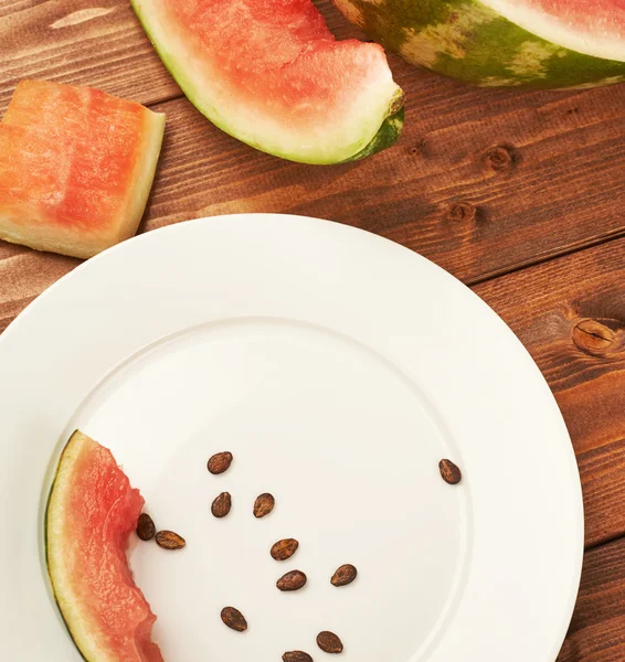 Slice of eaten watermelon — Stock Photo, Image