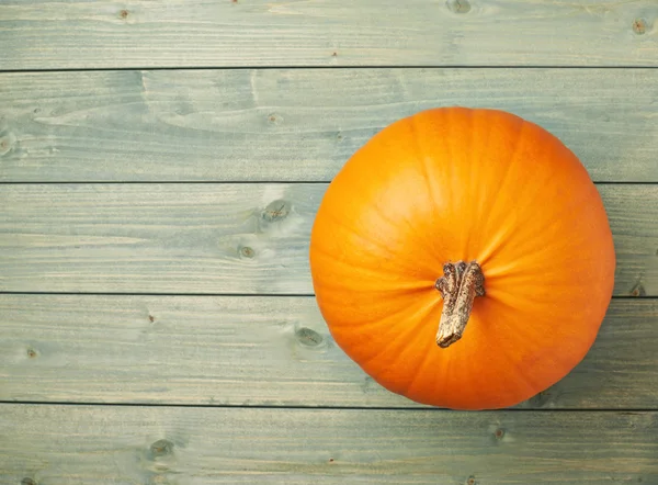 Pumpkin on  wooden boards — Stock Photo, Image
