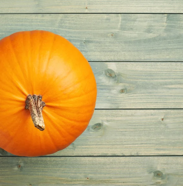 Orange pumpkin over the wooden boards — Stock Photo, Image