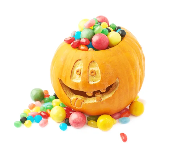 Хеллоуїн гарбуз, наповнений цукерками — стокове фото