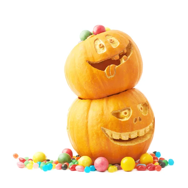 Two Halloween pumpkins filled with candies — Stock Photo, Image