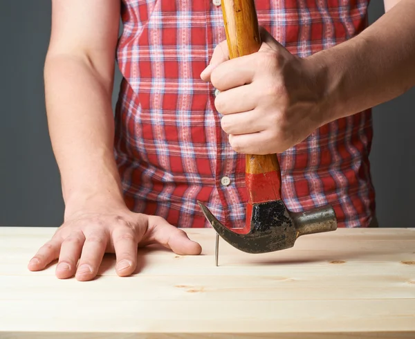 Taking out the nail composition — Stock Photo, Image