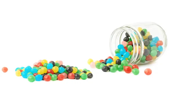 Candy ball sweets falling out of a jar — Stock Photo, Image