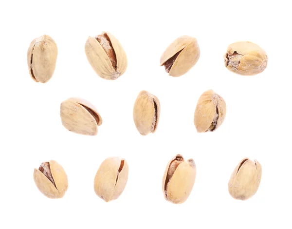 Multiple single pistachios isolated — Stock Photo, Image