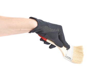 İzole bir boya fırçası tutan el