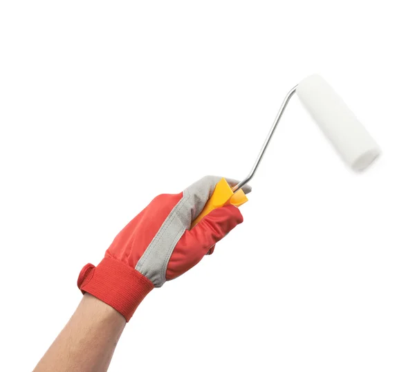 Hand som håller en paint roller — Stockfoto