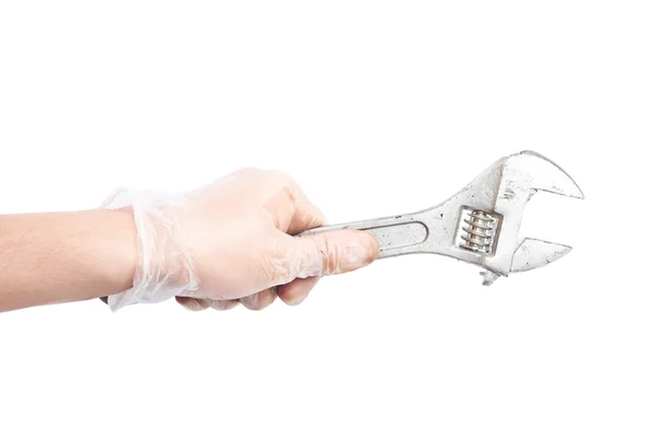 Worker's caucasian male hand holding tool — Stock Photo, Image