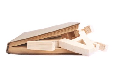 Closed book with the wooden letters clipart
