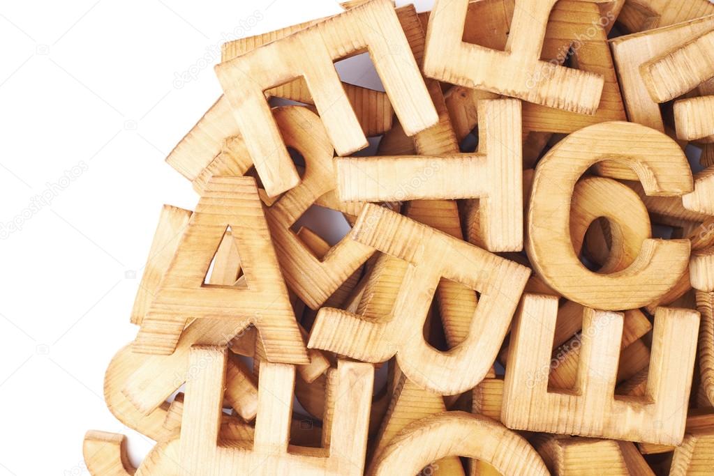 Surface covered with multiple wooden letters