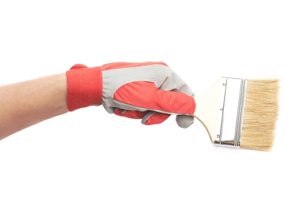 Hand holding a paint brush — Stock Photo, Image