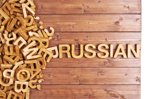 Word Russisch gemaakt met houten letters — Stockfoto