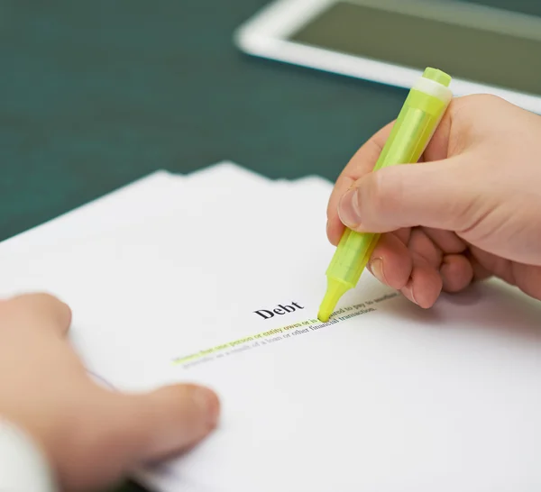 Markering van woorden in een schuld-definitie — Stockfoto