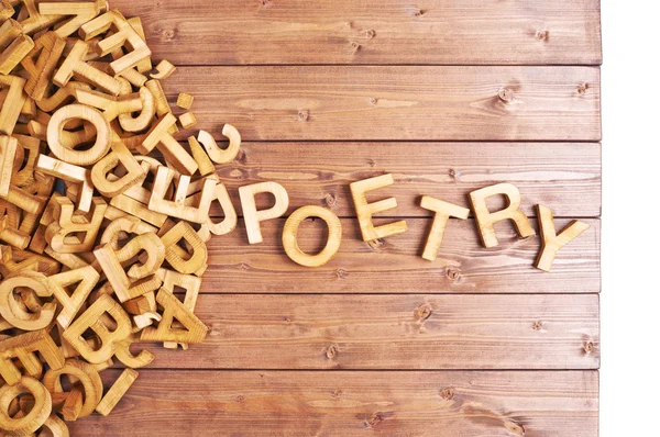 Word poetry made with wooden letters — Stock Photo, Image