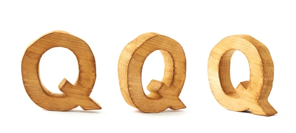 Set van drie blok houten letters Q — Stockfoto