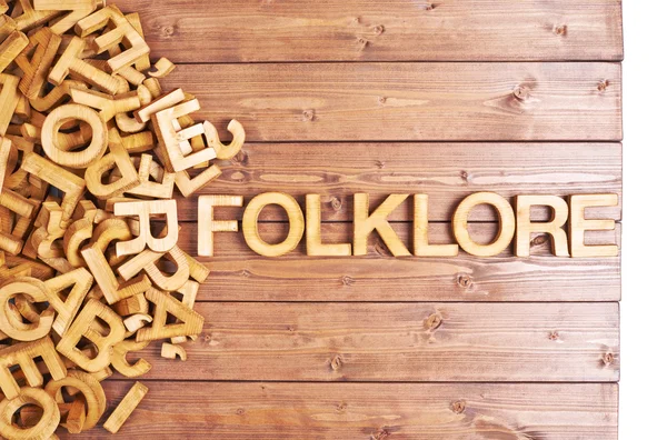 Folklore de palabras hecho con letras de madera —  Fotos de Stock