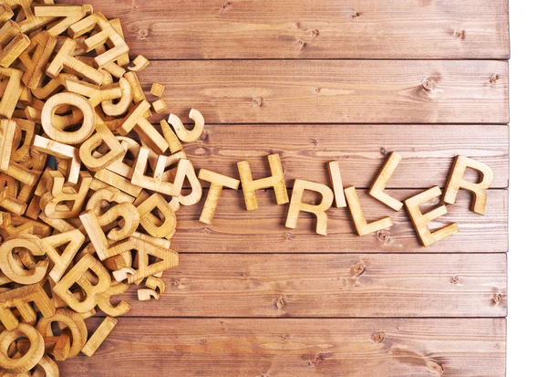 Word thriller made with wooden letters — Stock Photo, Image